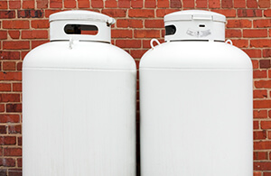 Propane tanks on a house's wall